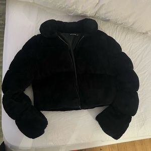 Black furry puffer